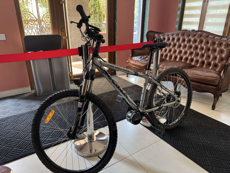 Электровелосипед на раме KONA