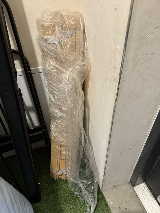 Łóżko regulowane Ikea Minnen z materacem i stelażem