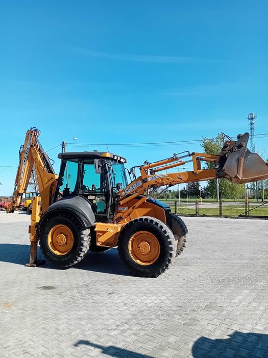 Koparko-ładowarka Case 695 Super R powershift opony 50%  Jcb brutto yoistick klima