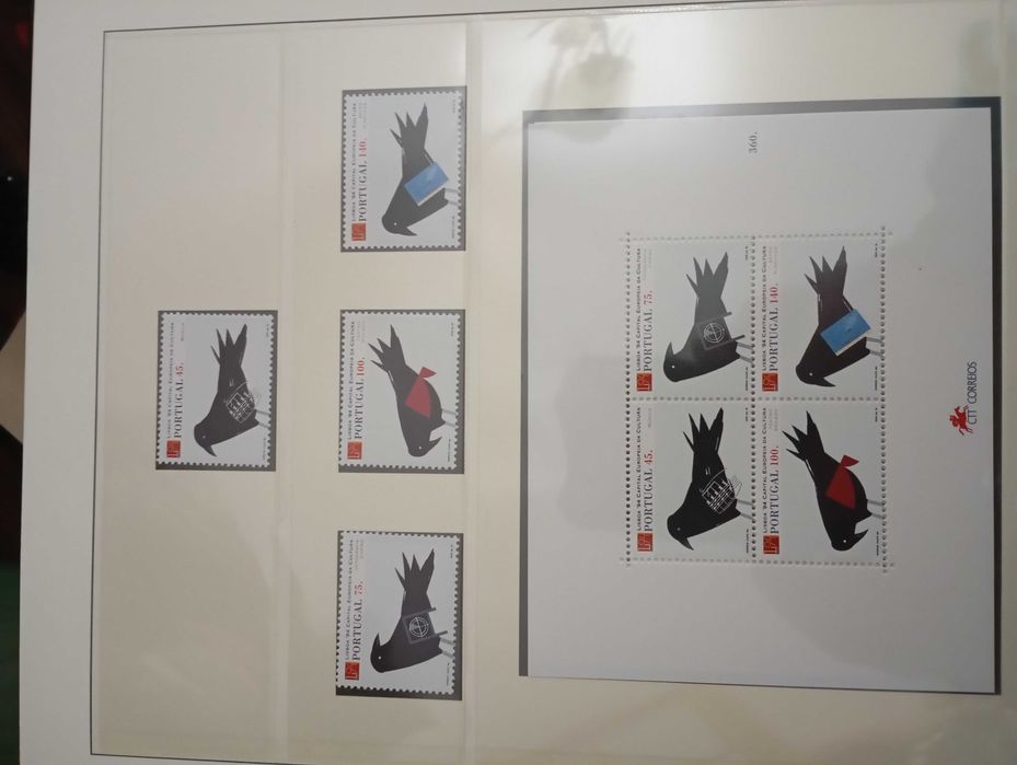 Coleção de selos de mais ou menos 50 álbuns