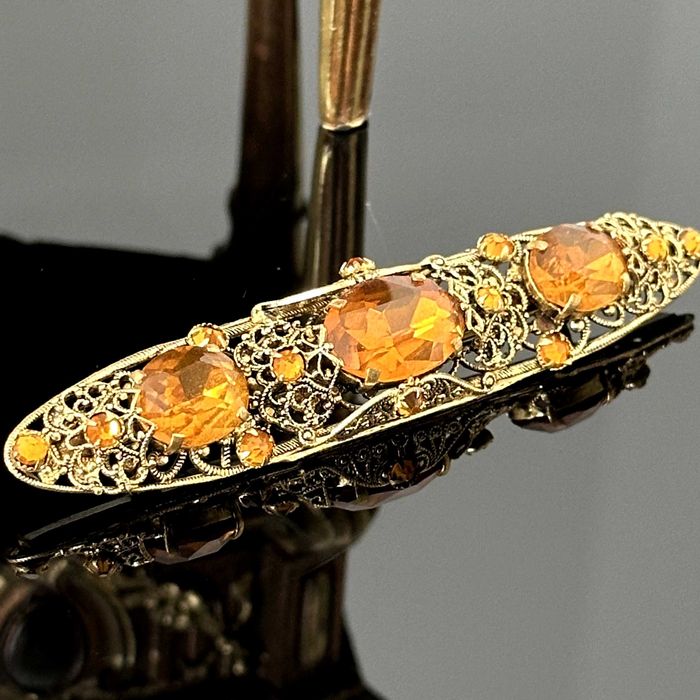 Pozłacana broszka z lat 60-tych – Stanley Hagler