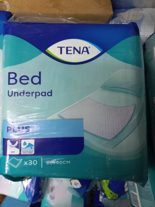 Продам два вида подгузников для взрослых .