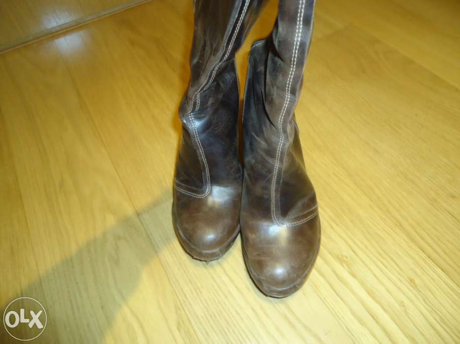Botas Fly em bom estado