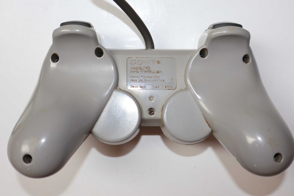 Konsola Sony PlayStation 1 PSX/PS1 model SCPH-7502 wersja PAL Pad DualShock model SCPH-1200 typ "M" Karta Pamięci Gra Komplet Kabli Stan Dobry