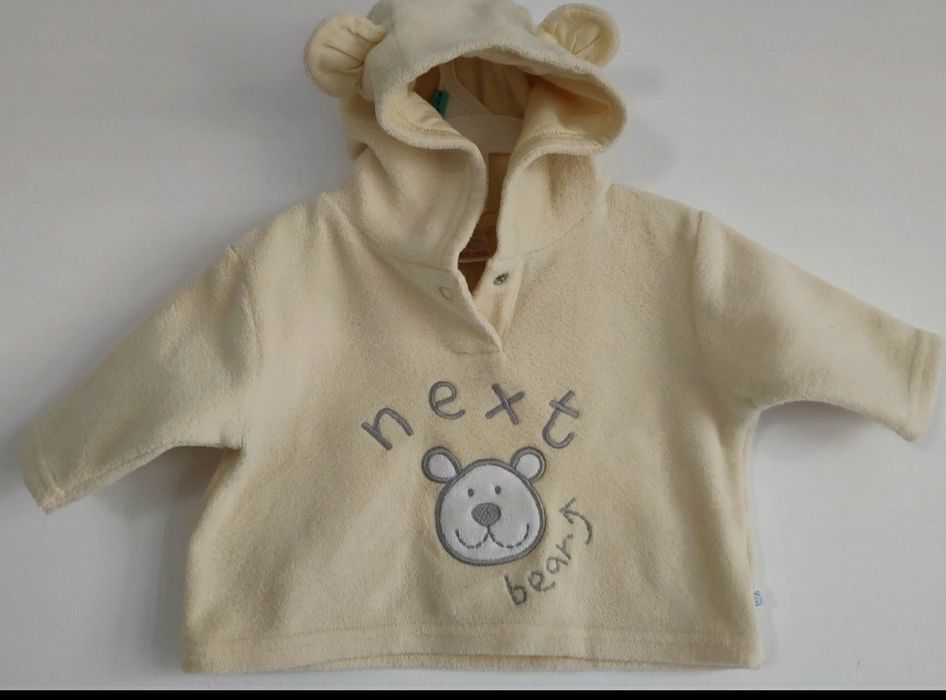 Żółta wyprawka: kaftanik, czapeczka i śliniak,