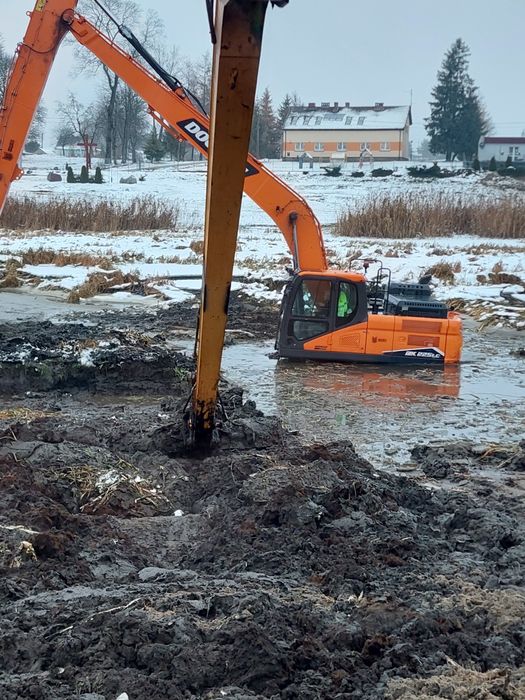 Kopanie stawów koparka long