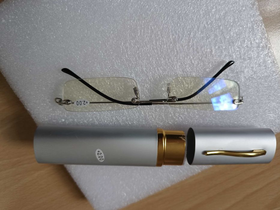 Титановые оправы, очки, футляры для очков