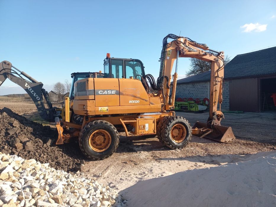 Koparka CASE WX120 Liebherr 314