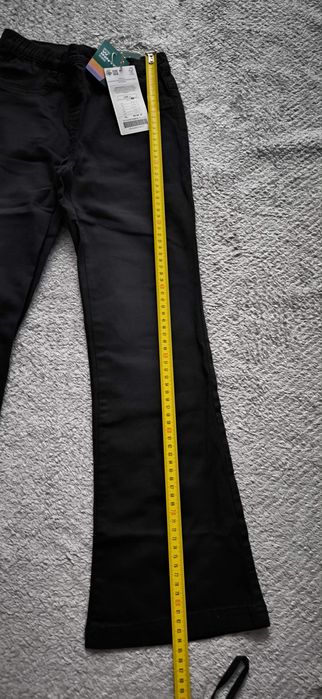 Nowe spodnie jeansowe coccodrillo r. 140 flare leg slim