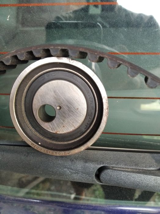 Ремень ГРМ з роликом на Логан 1,6 бензин