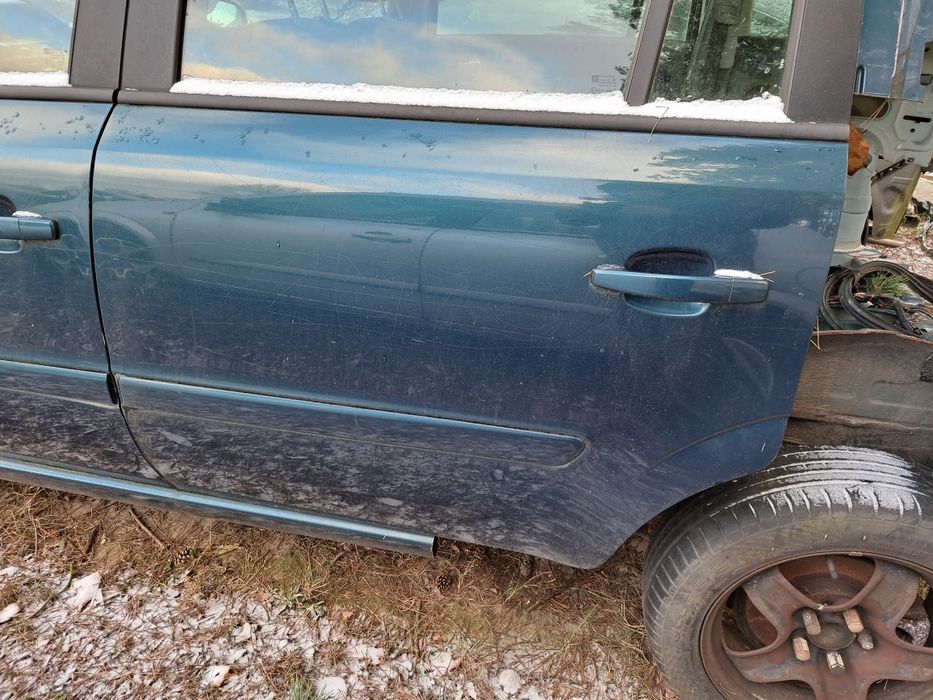 Drzwi lewe tył Opel zafira b z21u