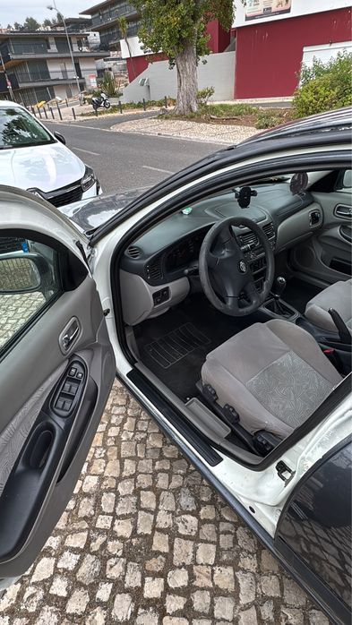 Nissan Almera 2003 — photo 2