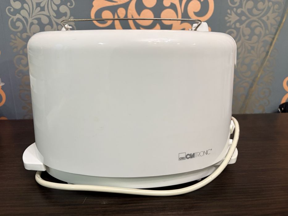 Продам тостер  б/у работает прекрасно .