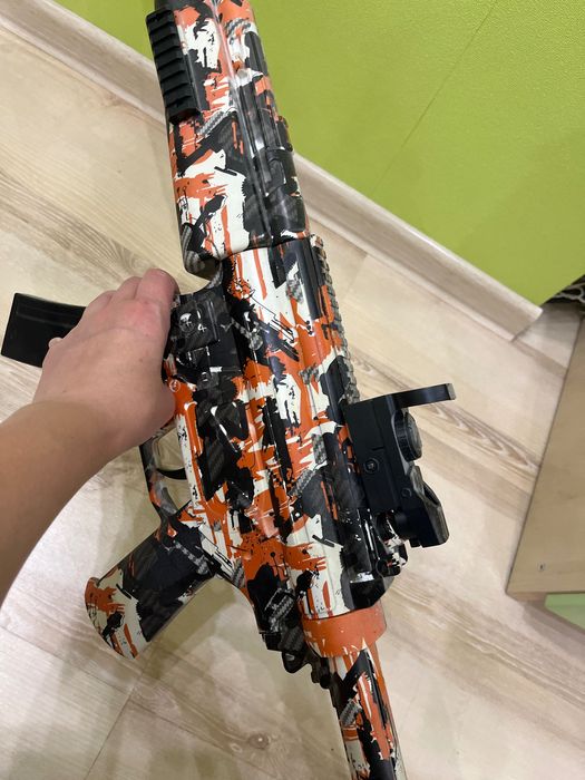 Дитячі іграшки автомат