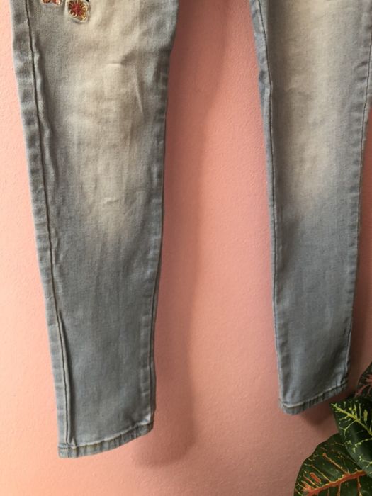 Calças de Ganga / Jeans bordados com flores e pássaro 38 (usadas 1x)