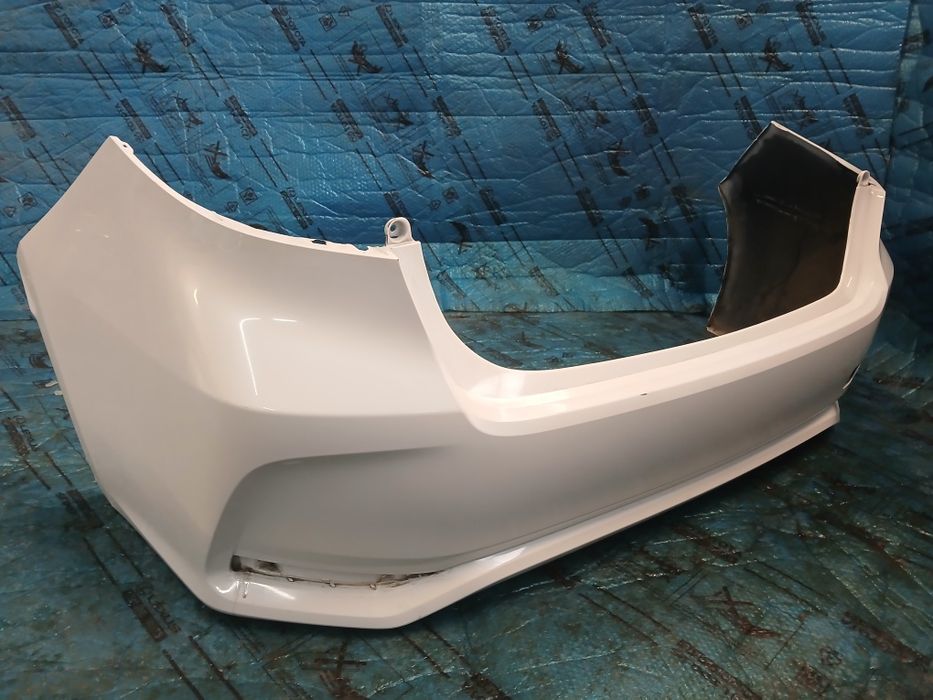 Zderzak tylny tył TOYOTA COROLLA E21 sedan  1L0  040 kolor 1f7 070