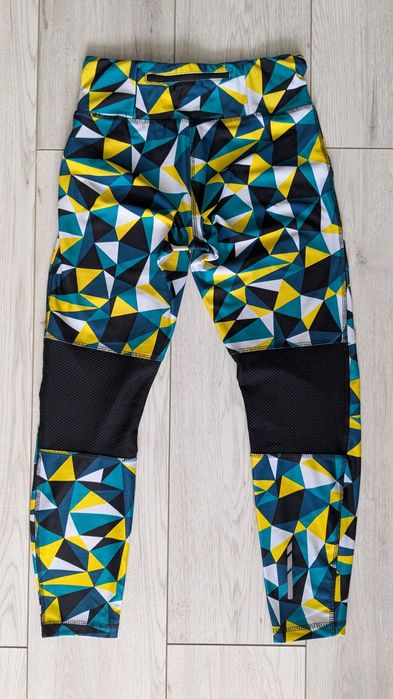 Wielokolorowe leginsy z kieszonką na zamek Crivit S 36