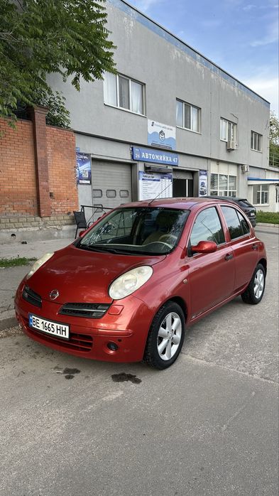 Nissan Micra Червоний, світлий салон