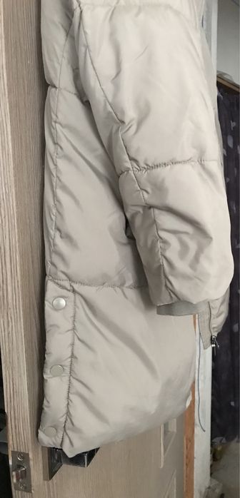 Пуховик теплий та комфортний