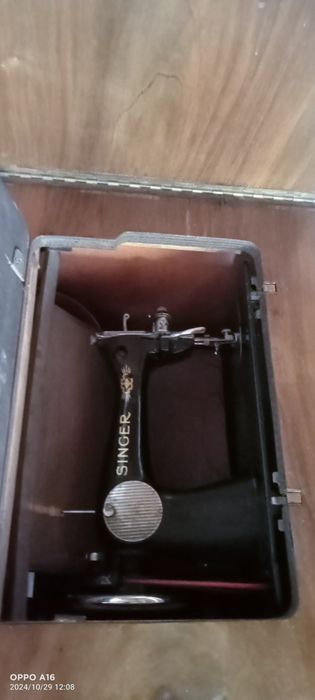 Máquina de costura.64585677306883123