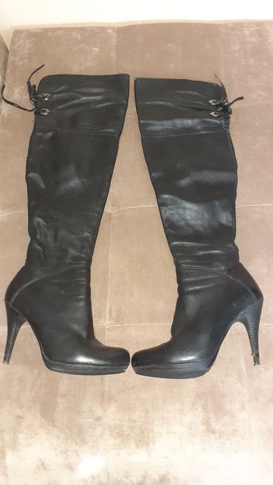 Кожані ботфорти .