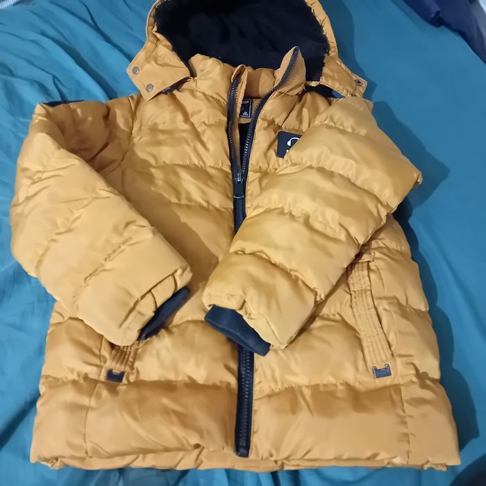 Ruda ciepła kurtka na 140 cm