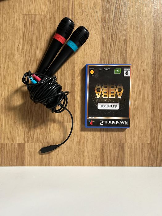 Mega Pack PS2 (Consola+ 3 Comandos+ 15 Jogos+ 2 Microfones+ 32MB Card)