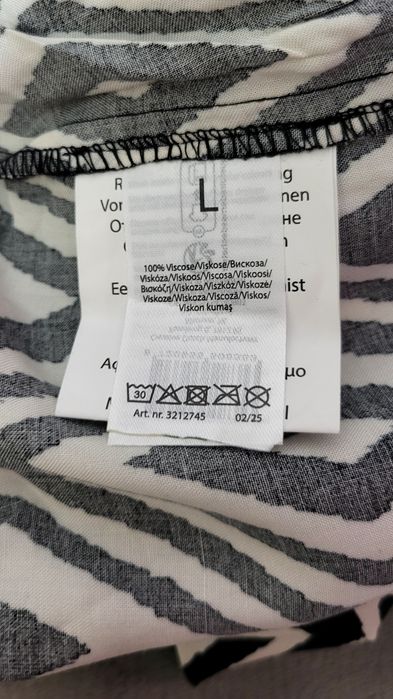 Eleganckie spodnie damskie L – czarno-biały wzór geometryczny, 1