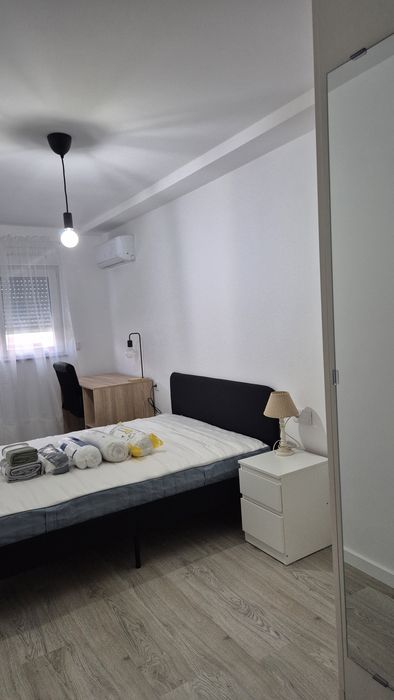 Quarto com cama dupla em T3  com sala