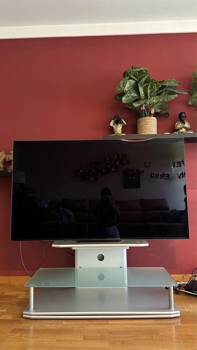 Base de TV rotativa cinza em vidro