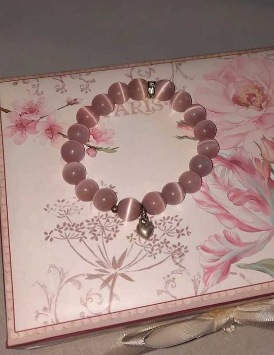 Różowa bransoletka z serduszkiem i cyroniami coquette