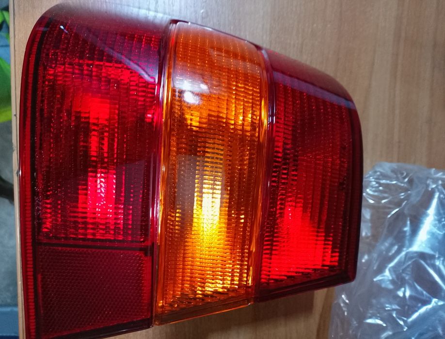 Задний левый фонарь Volvo 940L, новый
