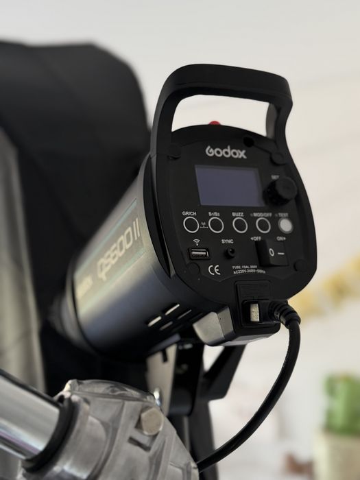 Імпульсне світло godox та синхронізатори