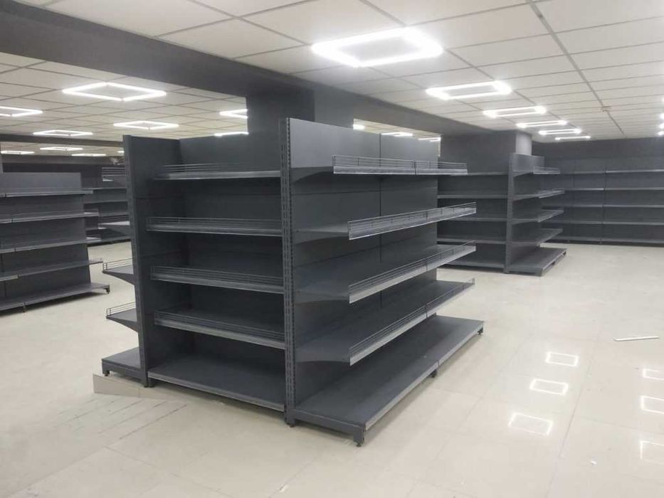 Торгові стелажі в магазин. Касовий прилавок. Вітрина. Торговий стелаж