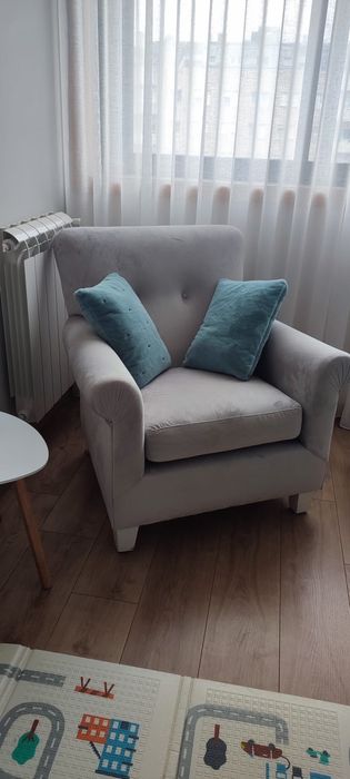 Poltrona elegante cinza