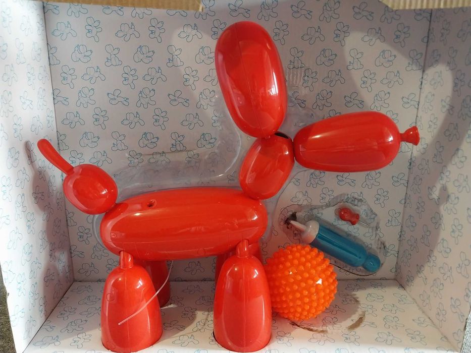 Робот собака Squeakee