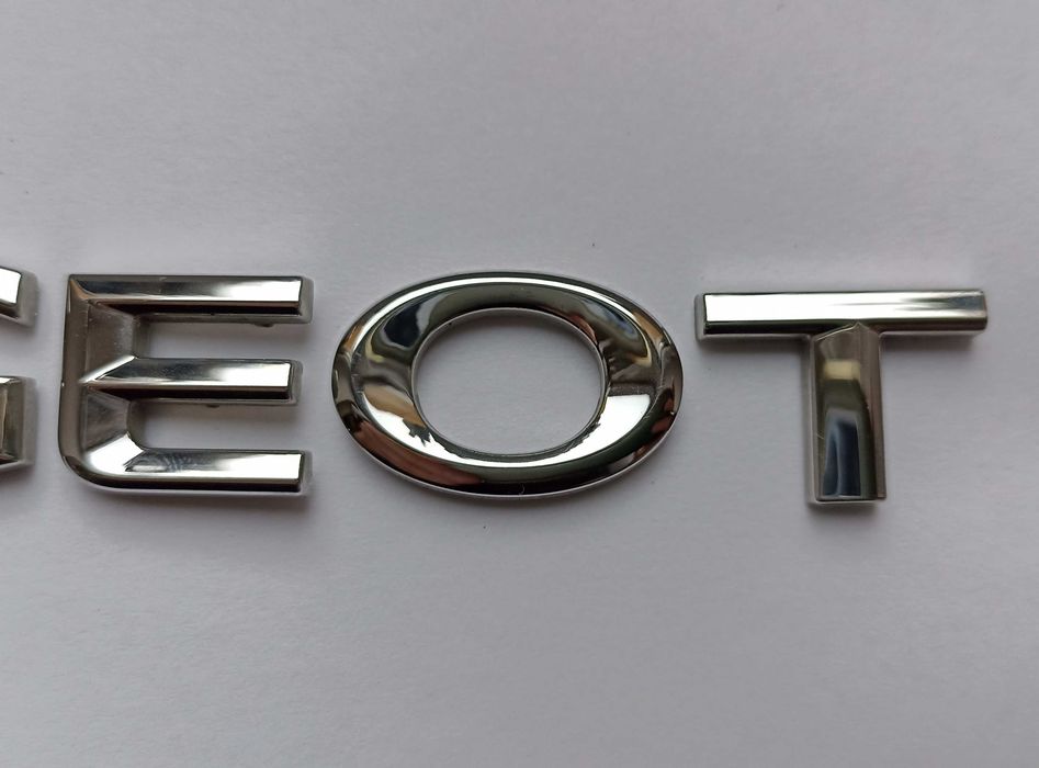 Napis emblemat Peugeot 107