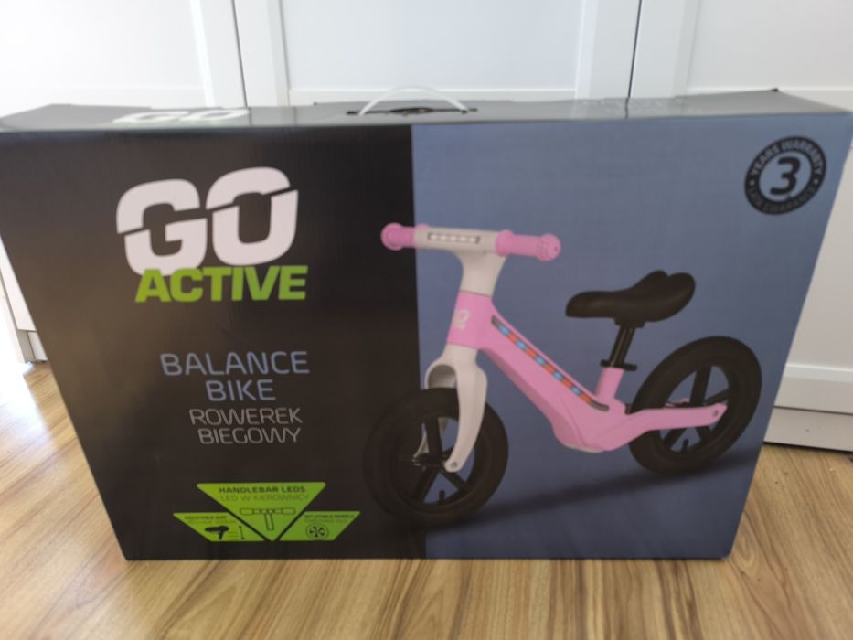 Rowerek biegowy LED, regulowane siodełko, pompowane koła