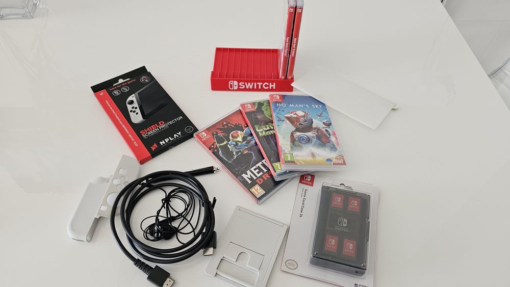 Nintendo switch Oled + 5 jogos tudo como novo