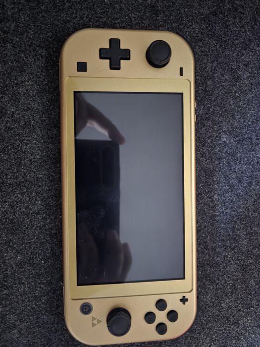 Nintendo Switch Lite - Hyrule Edition (Never Used)64729616262531121