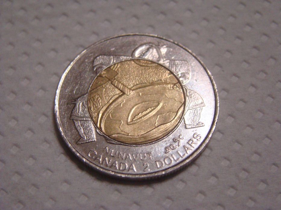 Продам колекційну монету 2 канадських долари НАНАВУТ  1999 р