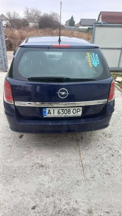 Авто Опель Астра 2009