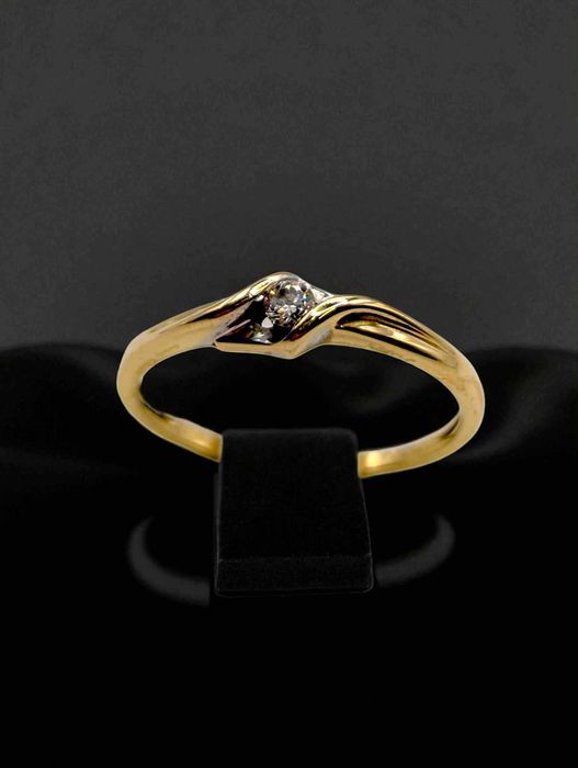 Złoty pierścionek z brylantem 585 /1,26