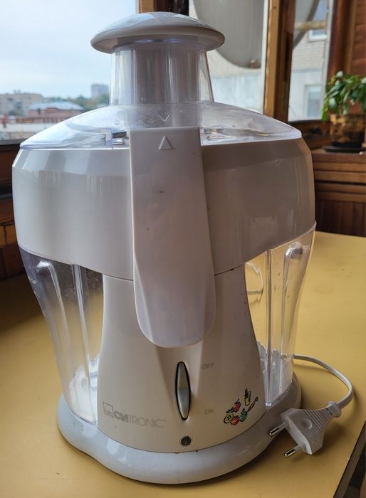 Электрическая соковыжималка