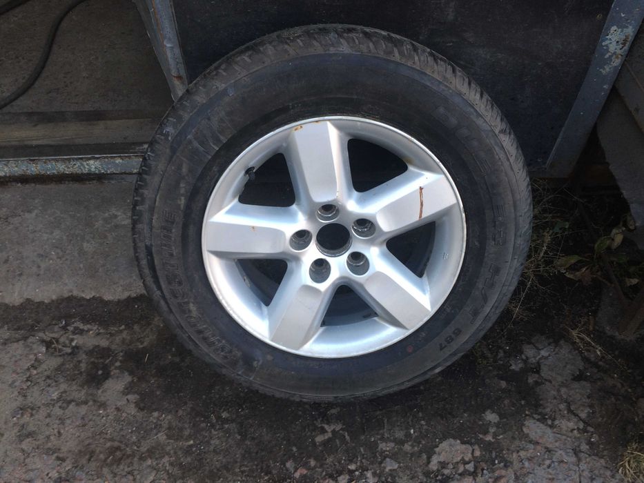 запаска Toyota 5*114.3 всесезонка 235/60-R16-состояние новой