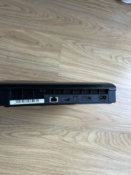 PlayStation 3 super slim com comandos e jogos