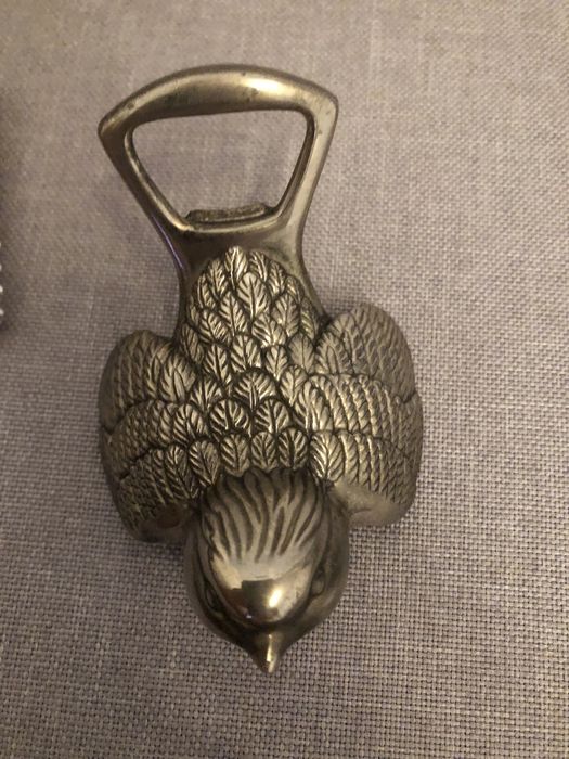 Abre capsulas garrafas