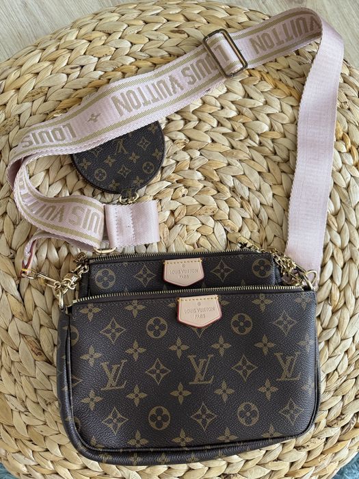 Mala Louis Vuitton com alça rosa