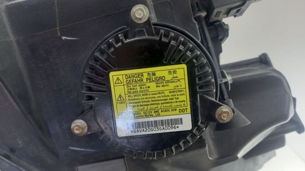 Фара левая Cadillac CTS 2008-2011 25897363