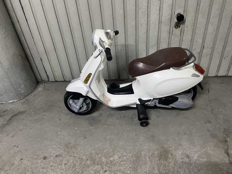 Scooter eletrica de crianca